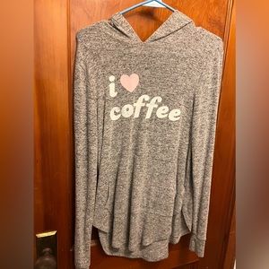 Loose fitting sweater.